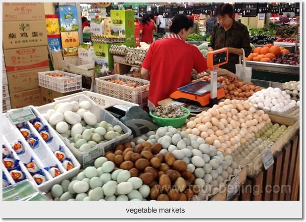 Trays of eggs and preserved eggs on a Beijing market stall