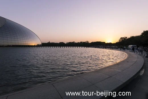 National Centre for the Performing Arts dome and reflecting water at sunset