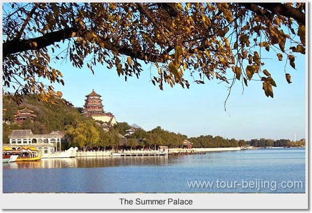Kunming Lake and the hillside pavilions of the Summer Palace beneath autumn branches