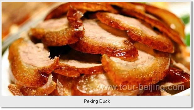 Slices of Beijing roast duck with golden-brown skin arranged on a plate